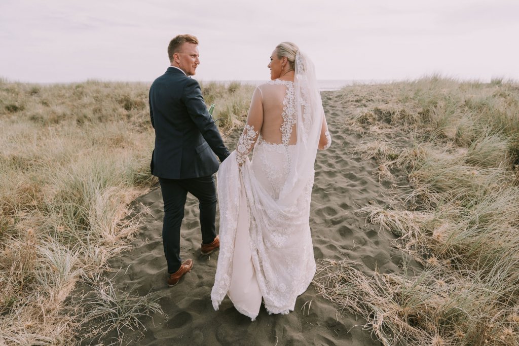 Real Bride Jamielle wearing her Custom Harriett Falvey Wedding Dress and Veil Made in New Zealand